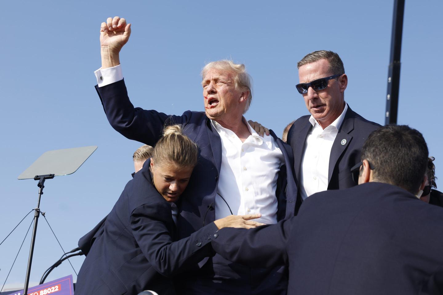 Donald Trump raises fist