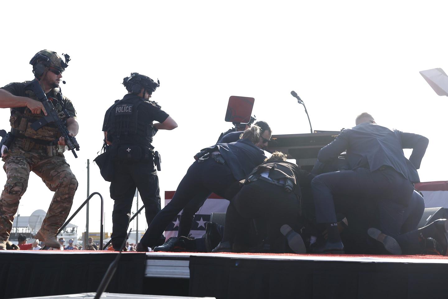 police and Secret Service on stage