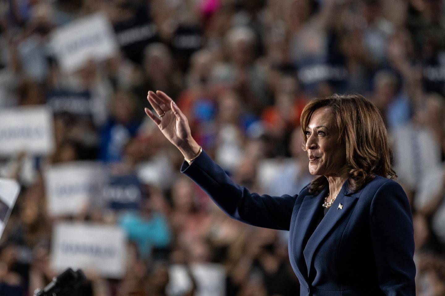 Kamala Harris waves