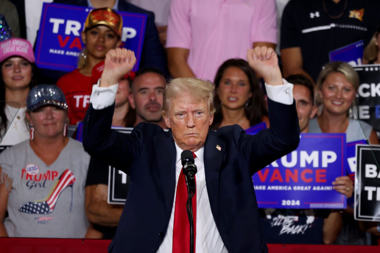 Donald Trump holds up fists