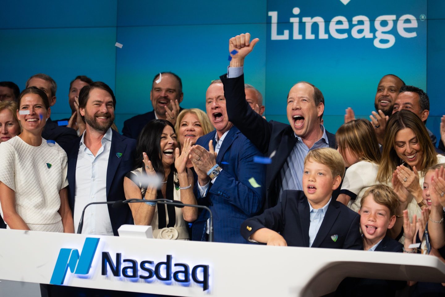 Lineage co-founder Adam Forste (second left), CEO Greg Lehmkuhl (center), and co-founder Kevin Marchetti (center right) ring the opening bell during the company's IPO at the Nasdaq in New York City on July 25, 2024.