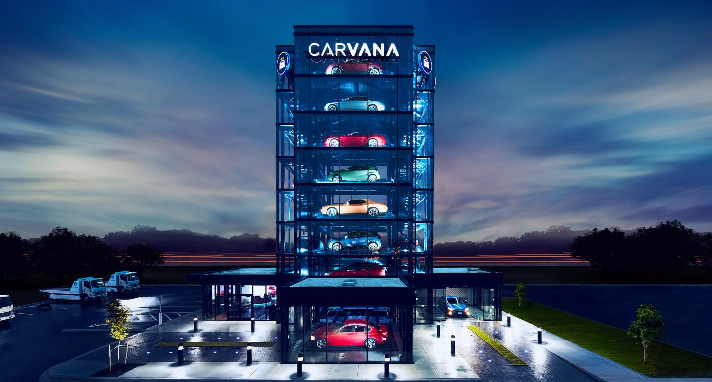 a car vending machine with a city skyline behind it