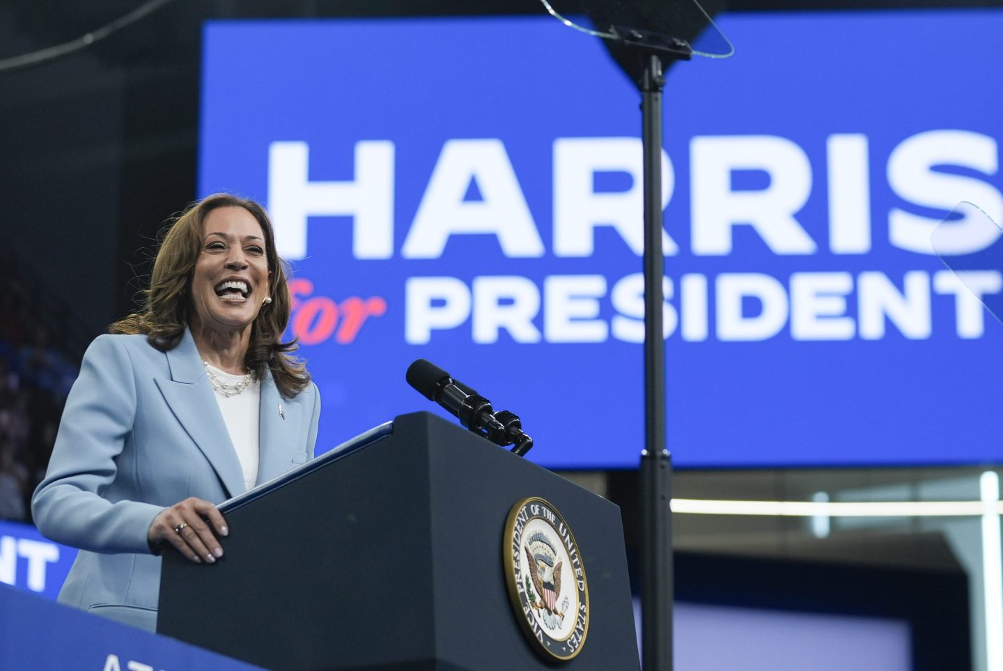 Kamala Harris speaking at podium