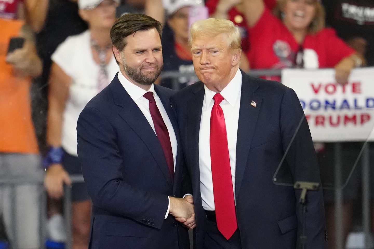 JD Vance and Donald Trump shake hands