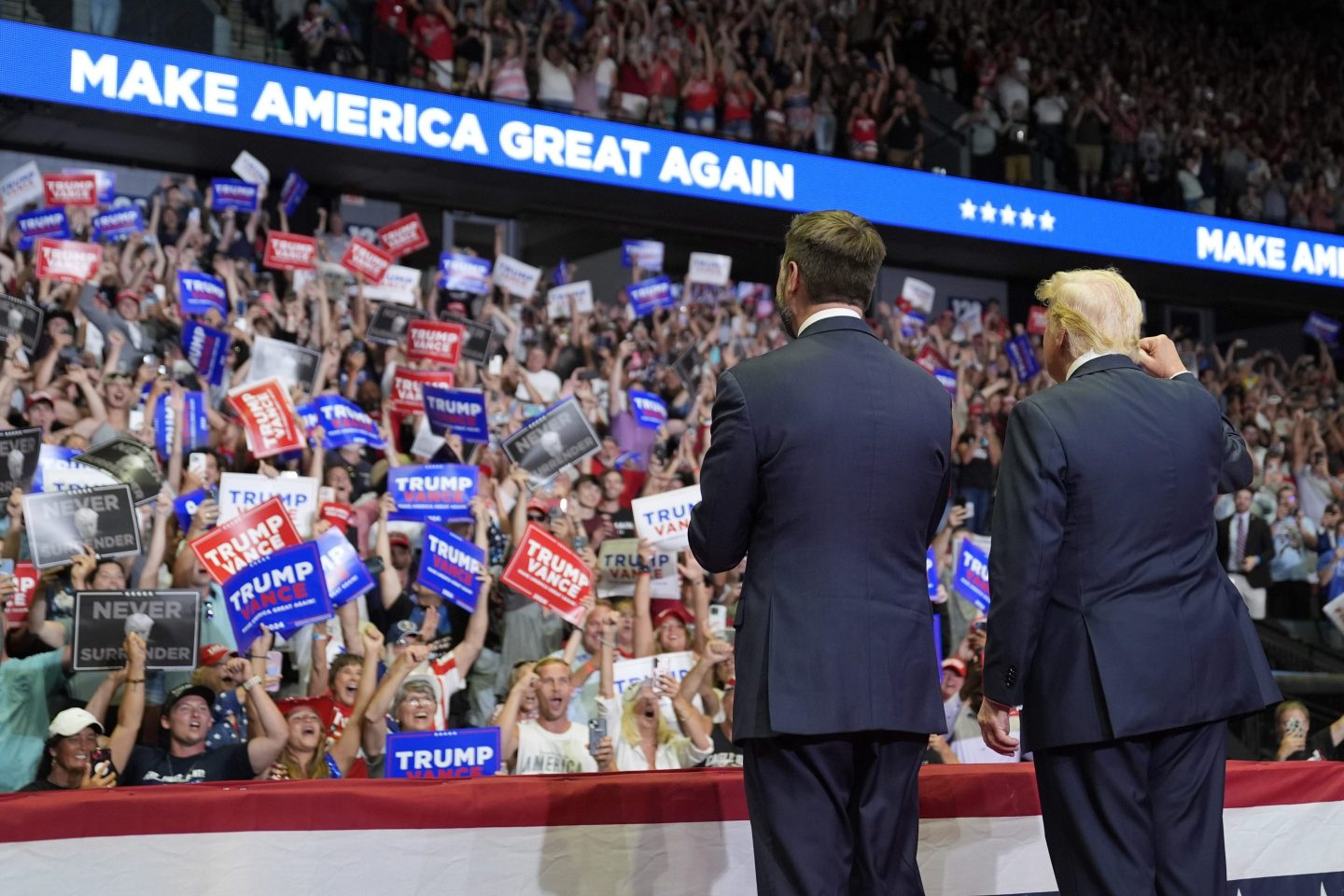 Republican presidential nominee former President Donald Trump and Republican vice presidential nominee Sen. JD Vance, R-Ohio, arrive a campaign rally on July 20, 2024, in Grand Rapids, Mich.