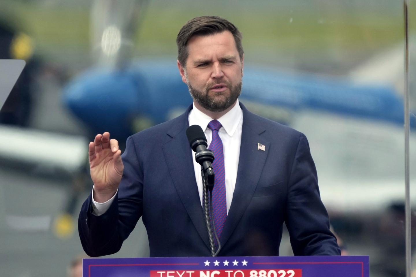 JD Vance speaks at podium