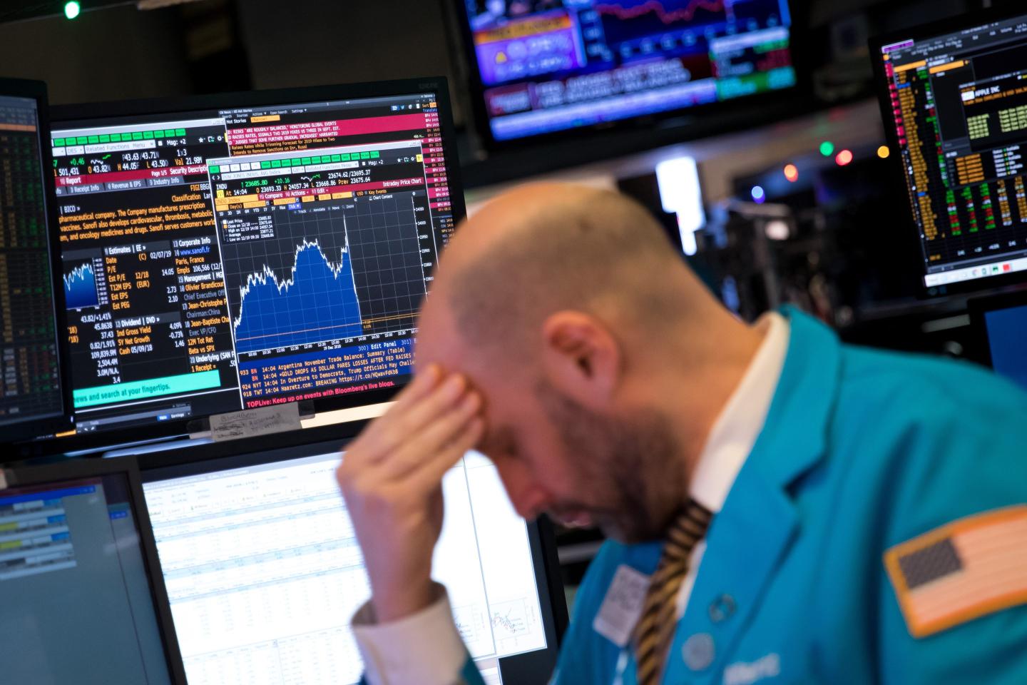 trader works on the floor of the New York Stock Exchange