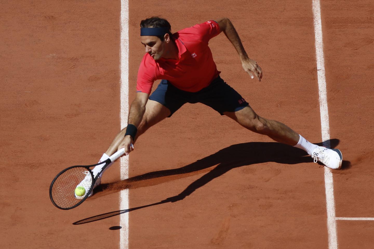 Roger Federer of Switzerland during his 6-2 6-4 6-3 victory over Dennis Istomin of Uzbekistan in the first round of the mens singles at Roland Garros on May 31, 2021 in Paris, France.(Photo by Mehdi Taamallah/NurPhoto via Getty Images)