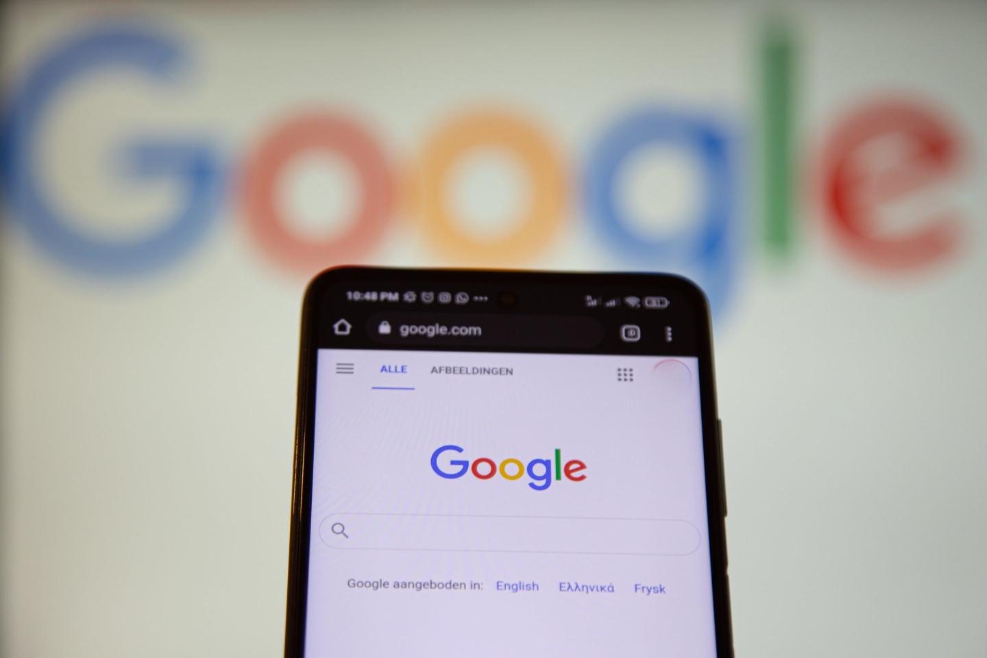 Google logo on a phone and a computer screen