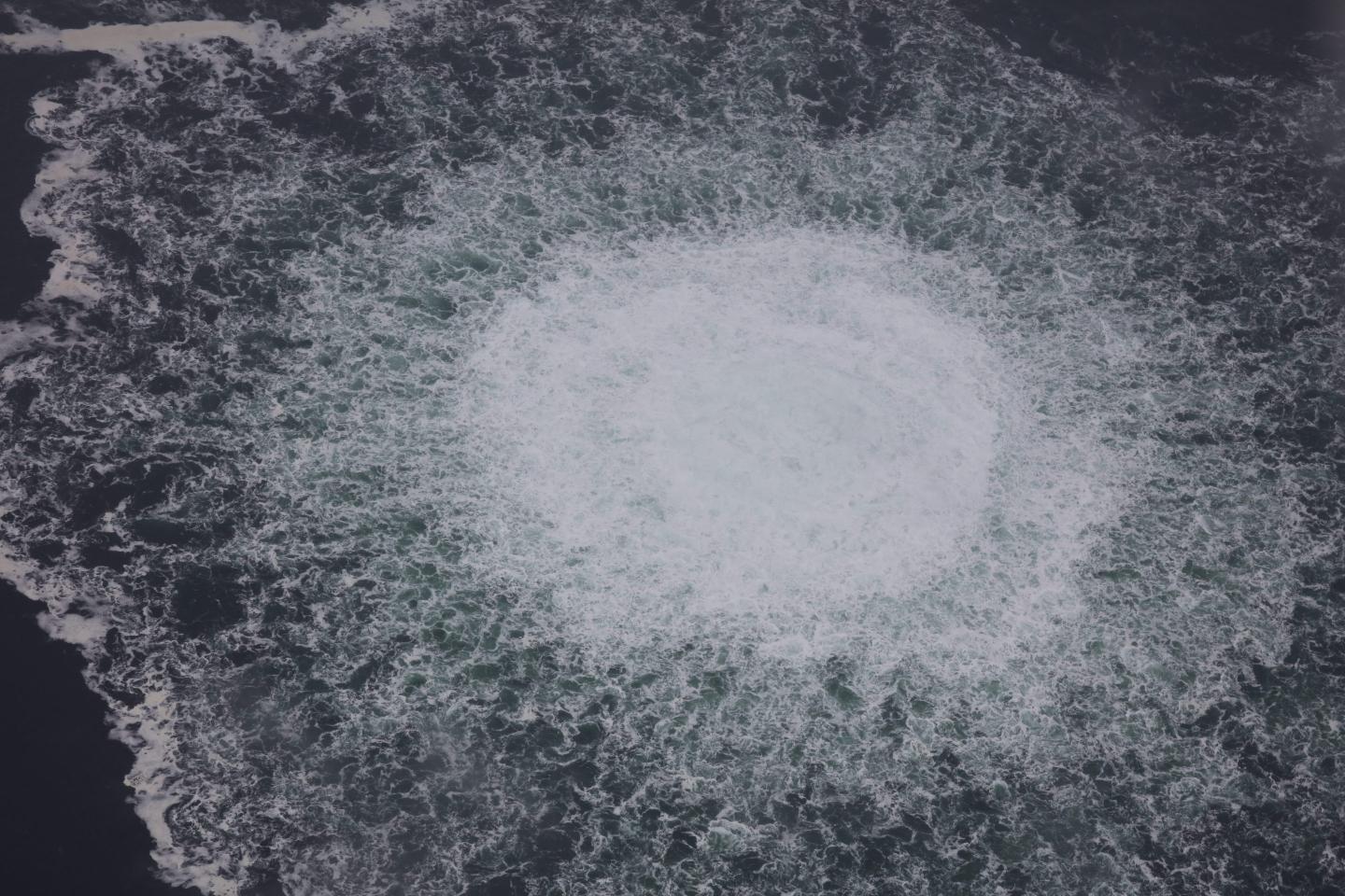 AT SEA, SWEDEN - SEPTEMBER 29: (----EDITORIAL USE ONLY - MANDATORY CREDIT - "SWEDISH COAST GUARD / HANDOUT" - NO MARKETING NO ADVERTISING CAMPAIGNS - DISTRIBUTED AS A SERVICE TO CLIENTS----) A gas leak causes bubbles on the surface of the water at Sea in Sweden on September 29, 2022. A fourth leak was reported Thursday in the Nord Stream gas pipelines off the coast of Sweden, authorities said. "There are two emissions in the Swedish economic zone, a larger one at Nord Stream 1 and a smaller one at Nord Stream 2," the Swedish Coast Guard said in a press statement. (Photo by Swedish Coast Guard / Handout/Anadolu Agency via Getty Images)