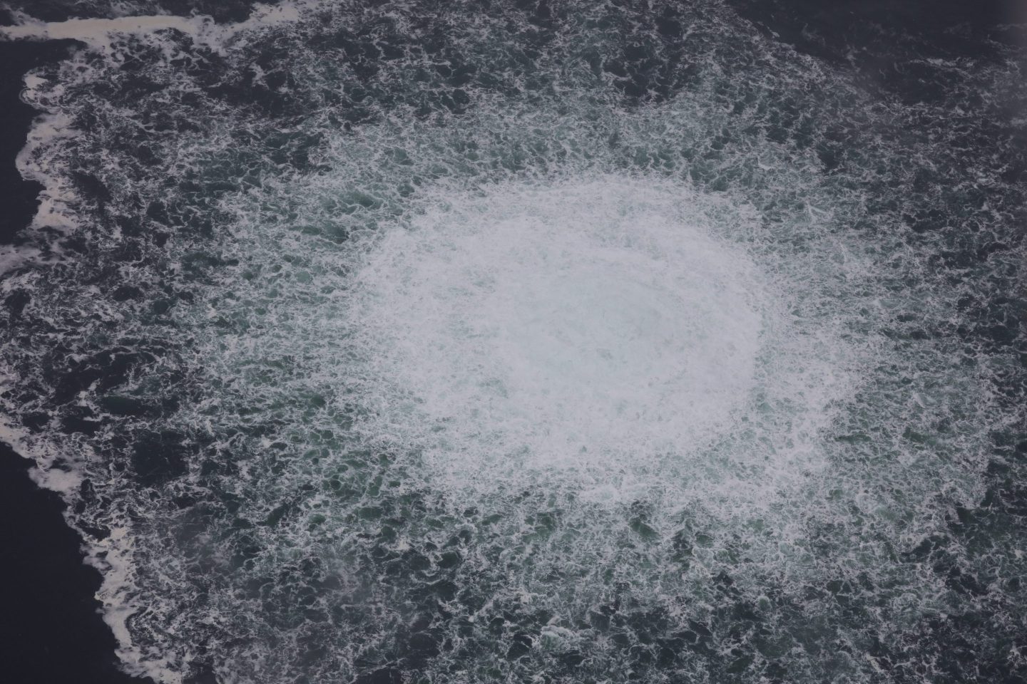 AT SEA, SWEDEN - SEPTEMBER 29: (----EDITORIAL USE ONLY - MANDATORY CREDIT - "SWEDISH COAST GUARD / HANDOUT" - NO MARKETING NO ADVERTISING CAMPAIGNS - DISTRIBUTED AS A SERVICE TO CLIENTS----) A gas leak causes bubbles on the surface of the water at Sea in Sweden on September 29, 2022. A fourth leak was reported Thursday in the Nord Stream gas pipelines off the coast of Sweden, authorities said. "There are two emissions in the Swedish economic zone, a larger one at Nord Stream 1 and a smaller one at Nord Stream 2," the Swedish Coast Guard said in a press statement. (Photo by Swedish Coast Guard / Handout/Anadolu Agency via Getty Images)