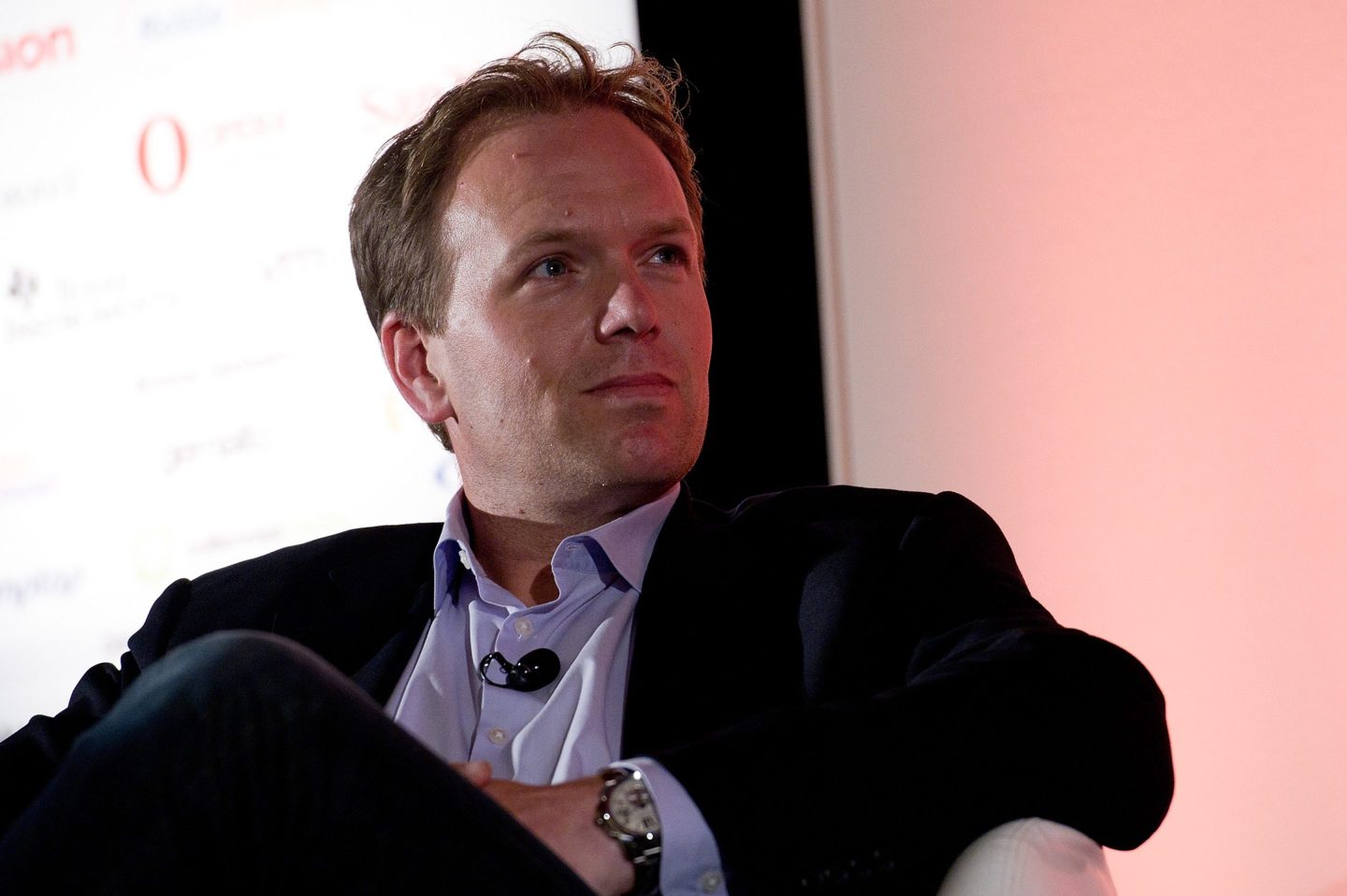 Venu Sports CEO Pete Distad sits in a chair