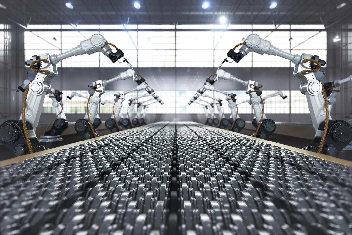 Robotic arms on assembly line