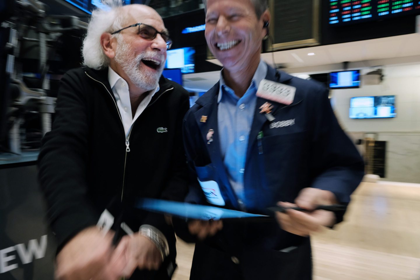 stock traders laughing