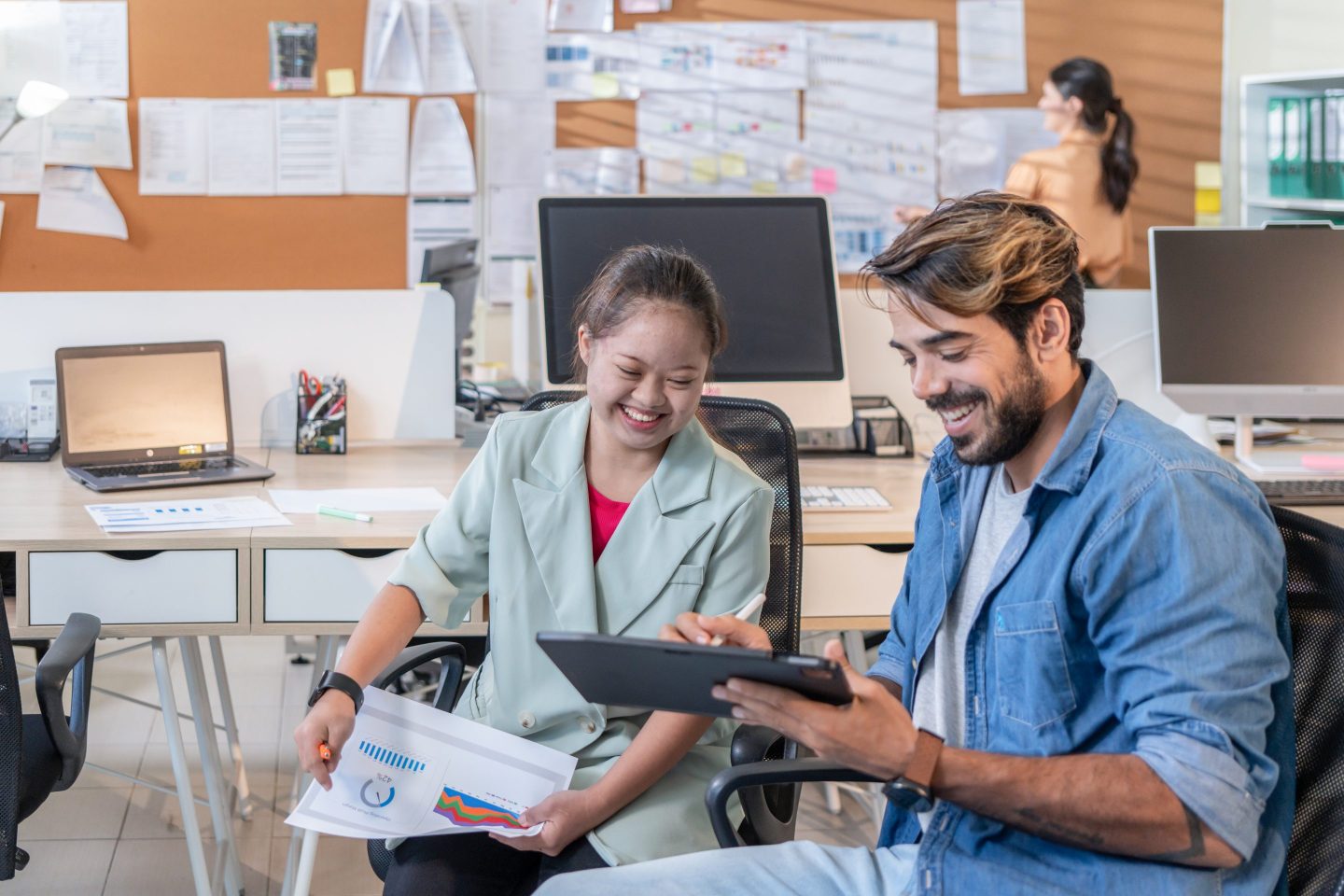 Neurodiverse employees working together.