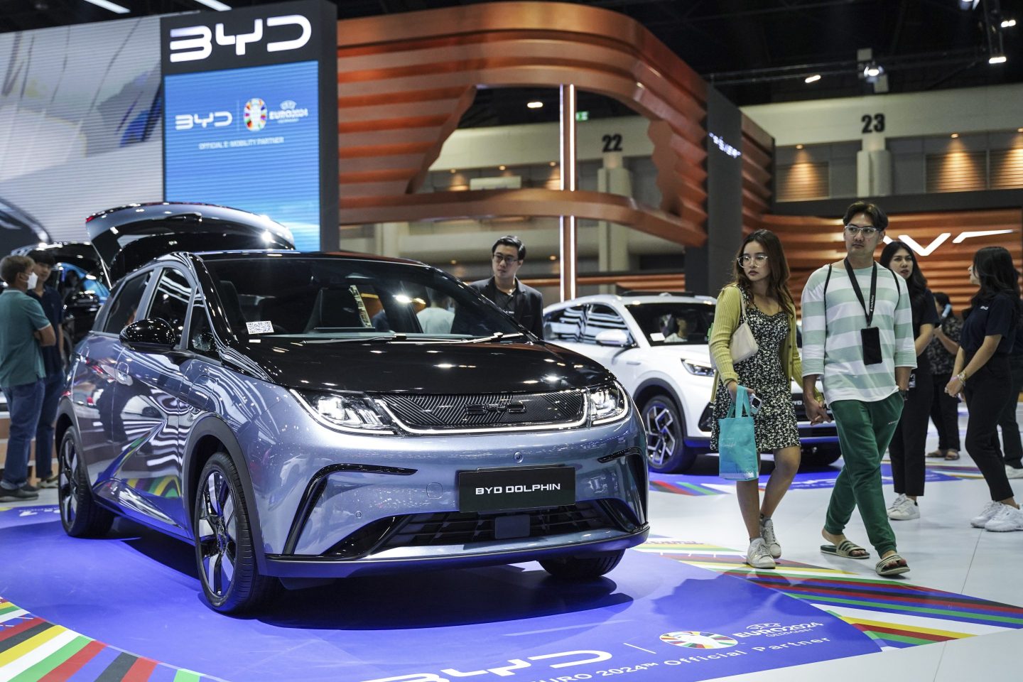 Visitors check out the BYD Dolphin electric car at the 45th Bangkok International Motor Show in Bangkok on March 30, 2024.