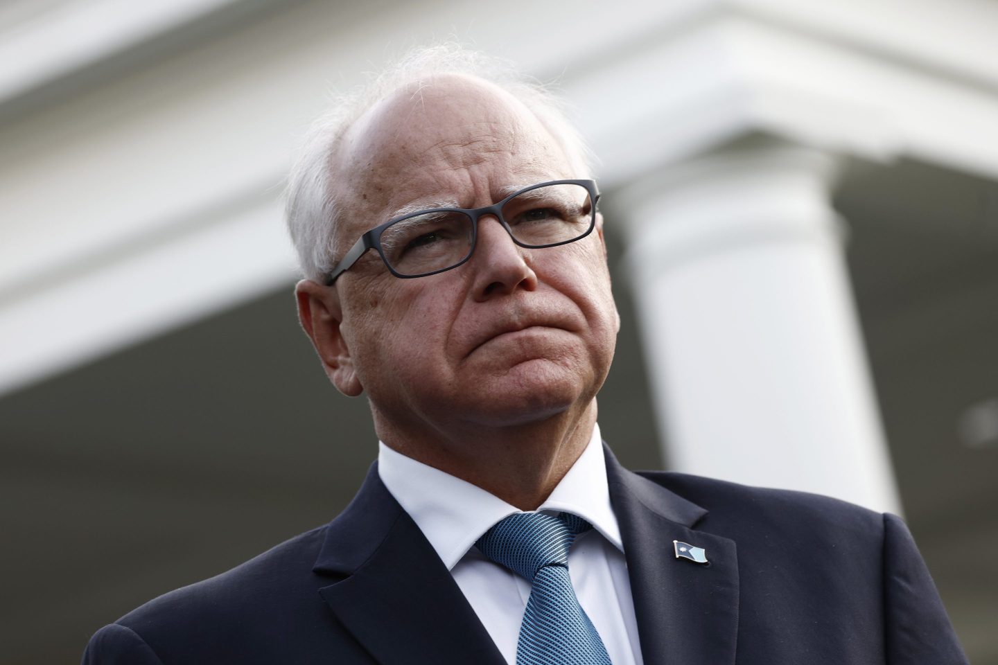 Tim Walz seen after a group of Democratic governors met with Biden last month.