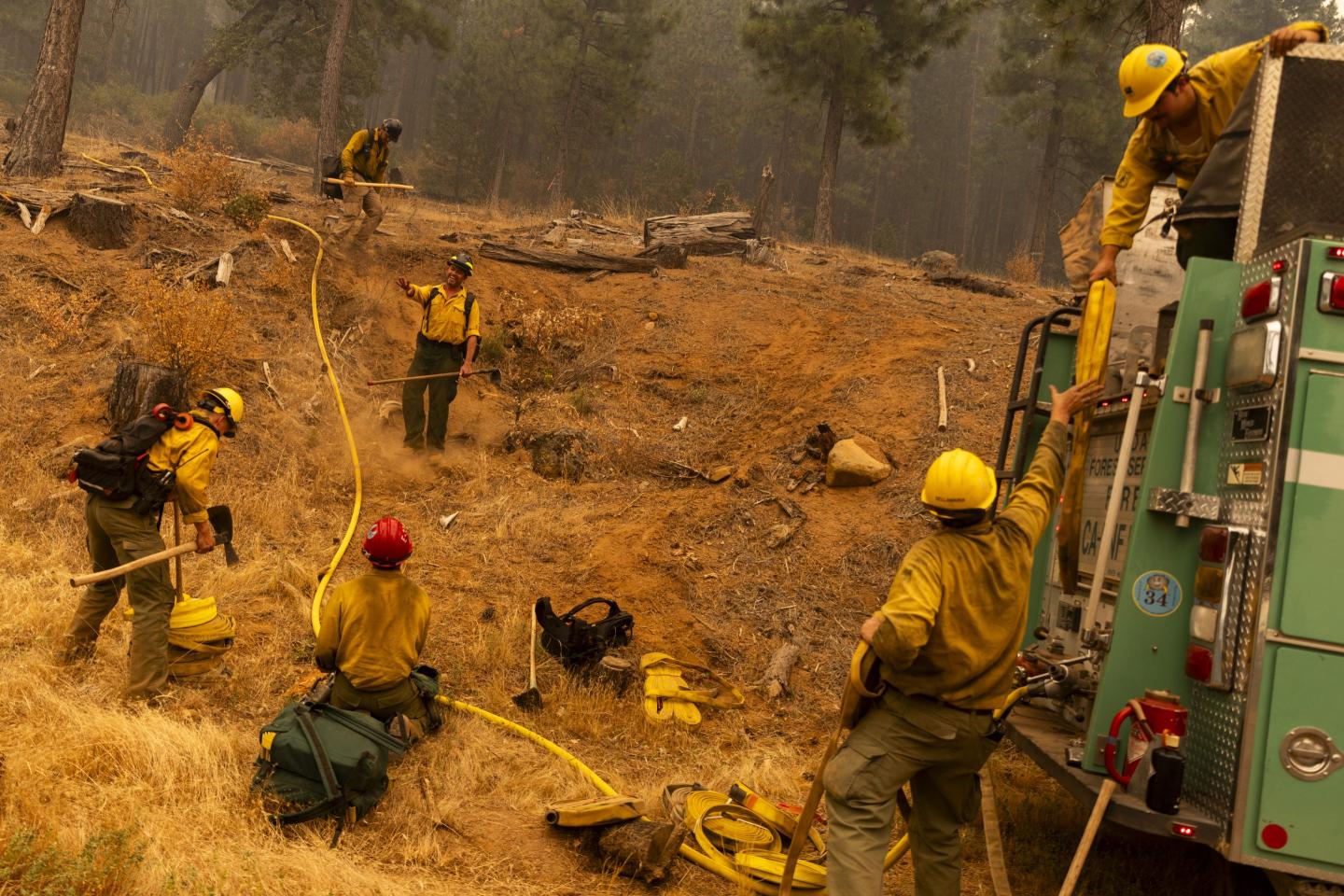 Firefighters in Northern California work to contain the Park Fire.