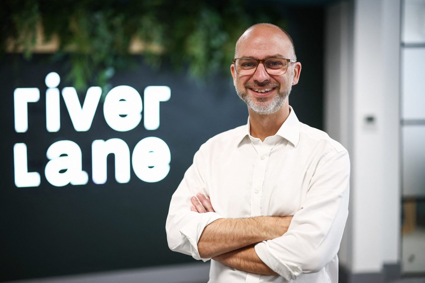Steve Brierley, CEO and Founder of Riverlane, poses inside their office in Cambridge, eastern England, on July 25, 2024. Promising society-changing breakthroughs in drug development and tackling climate change, quantum computing has long been talked of as a potentially revolutionary technology. "Quantum computing is not going to be just slightly better than the previous computer, it's going to be a huge step forward. And that has wide implications," said Riverlane founder Steve Brierley, at the company's headquarters in Cambridge, eastern England. (Photo by HENRY NICHOLLS / AFP) / TO GO WITH AFP STORY BY James PHEBY (Photo by HENRY NICHOLLS/AFP via Getty Images)