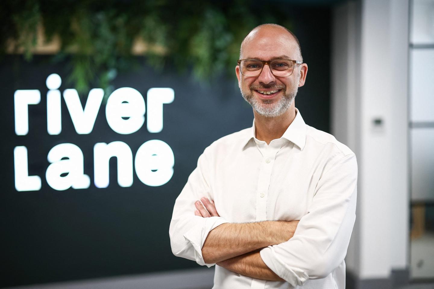 Steve Brierley, CEO and Founder of Riverlane, poses inside their office in Cambridge, eastern England, on July 25, 2024. Promising society-changing breakthroughs in drug development and tackling climate change, quantum computing has long been talked of as a potentially revolutionary technology. "Quantum computing is not going to be just slightly better than the previous computer, it's going to be a huge step forward. And that has wide implications," said Riverlane founder Steve Brierley, at the company's headquarters in Cambridge, eastern England. (Photo by HENRY NICHOLLS / AFP) / TO GO WITH AFP STORY BY James PHEBY (Photo by HENRY NICHOLLS/AFP via Getty Images)