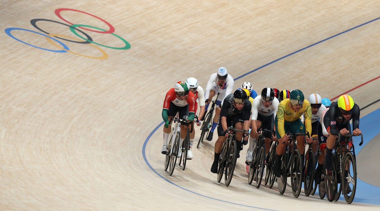 multiple cyclists on a track
