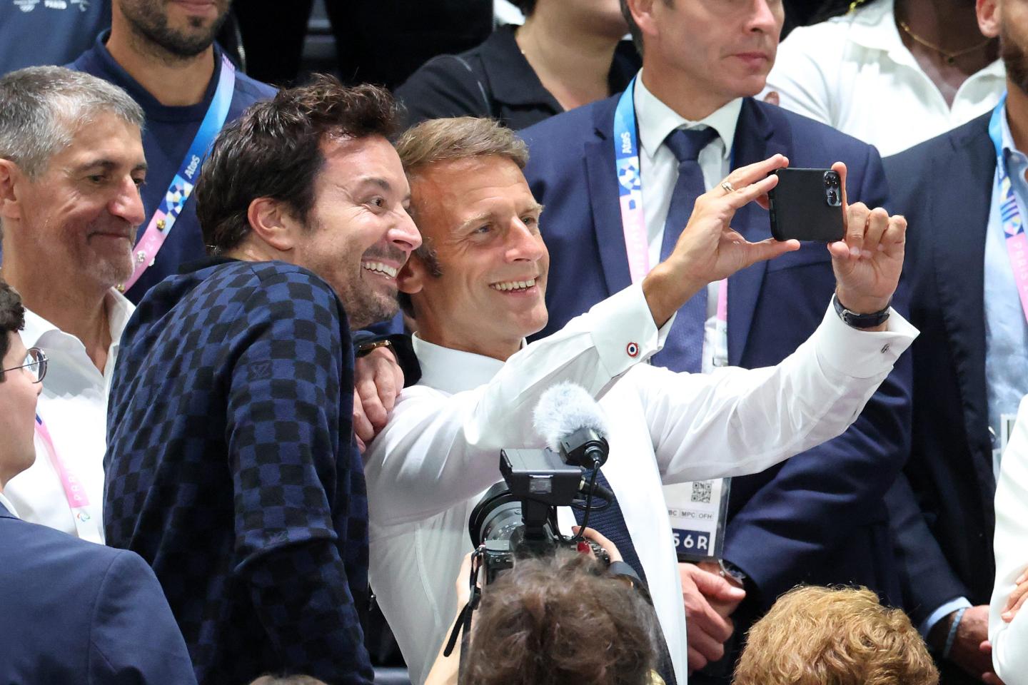 PARIS, FRANCE - AUGUST 10: Entertainer Jimmy Fallon and French President Emmanuel Macron attend the Men's Gold Medal game between Team France and Team United States on day fifteen of the Olympic Games Paris 2024 at Bercy Arena on August 10, 2024 in Paris, France. (Photo by Pascal Le Segretain/Getty Images)