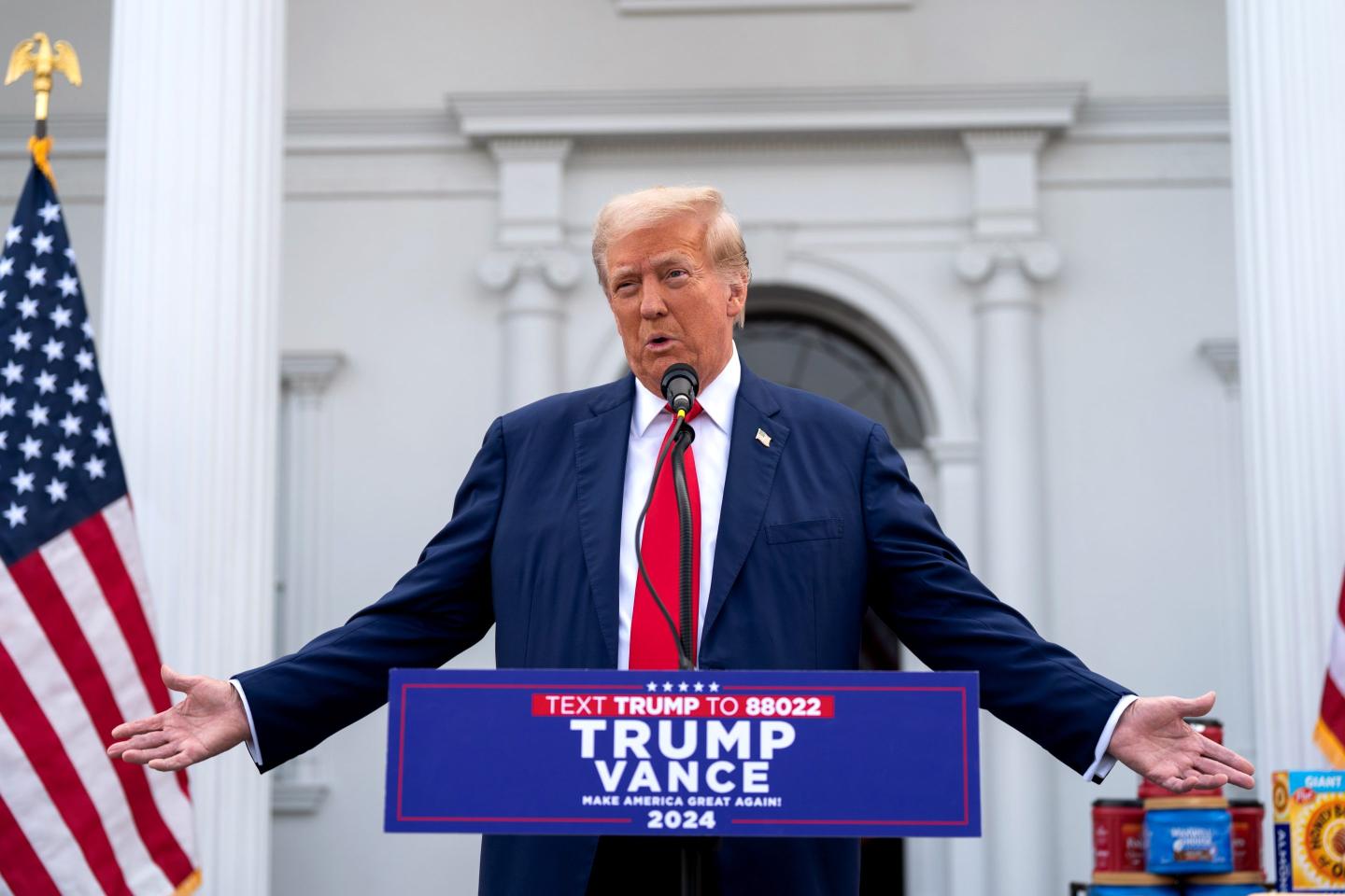 Donald Trump spreading arms open