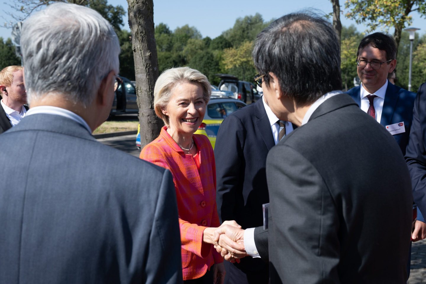 Ursula von der Leyen, President of the European Commission, is welcomed by representatives of TSMC at a symbolic ground-breaking ceremony on the future site of a chip factory to be known as the European Semiconductor Manufacturing Company (ESMC).
