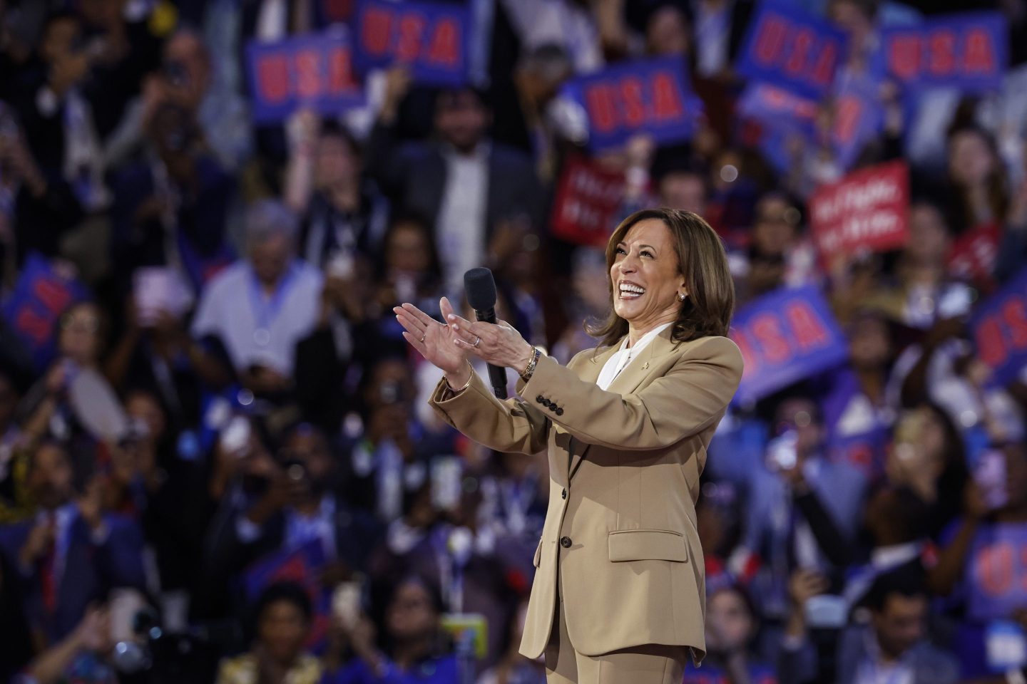Kamala Harris greets the crowd at a rally.