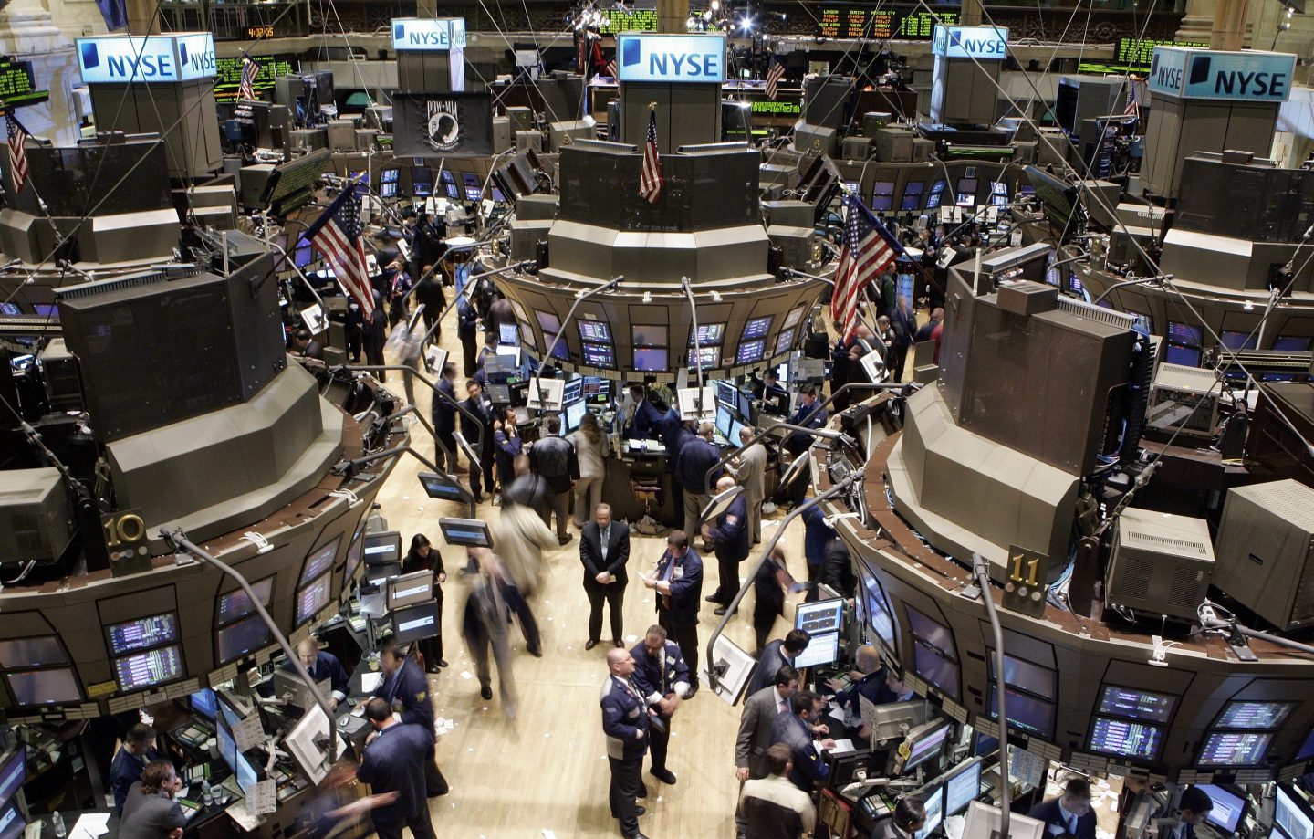 Wall Street traders on the floor of the New York Stock Exchange.