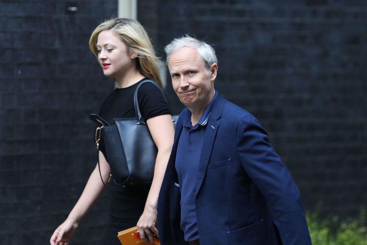 Kathryn <a href="https://fortune.com/company/parsons/" target="_blank">Parsons</a>, co-founder of Decoded, left, and Luke Johnson, co-founder of Risk Capital Partners LLP, arrive in Downing Street for a business advisory group meeting in London, U.K., on Thursday, July 20, 2017. U.K. Prime Minister Theresa May will chair the first in a regular series of meetings of the business council in her official Downing Street residence, with discussions due to focus on the terms of the U.K.s withdrawal from the European Union, and wider economic issues such as t§he governments industrial strategy.