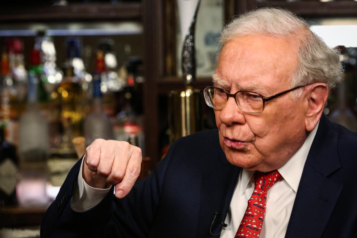 Warren Buffett points down