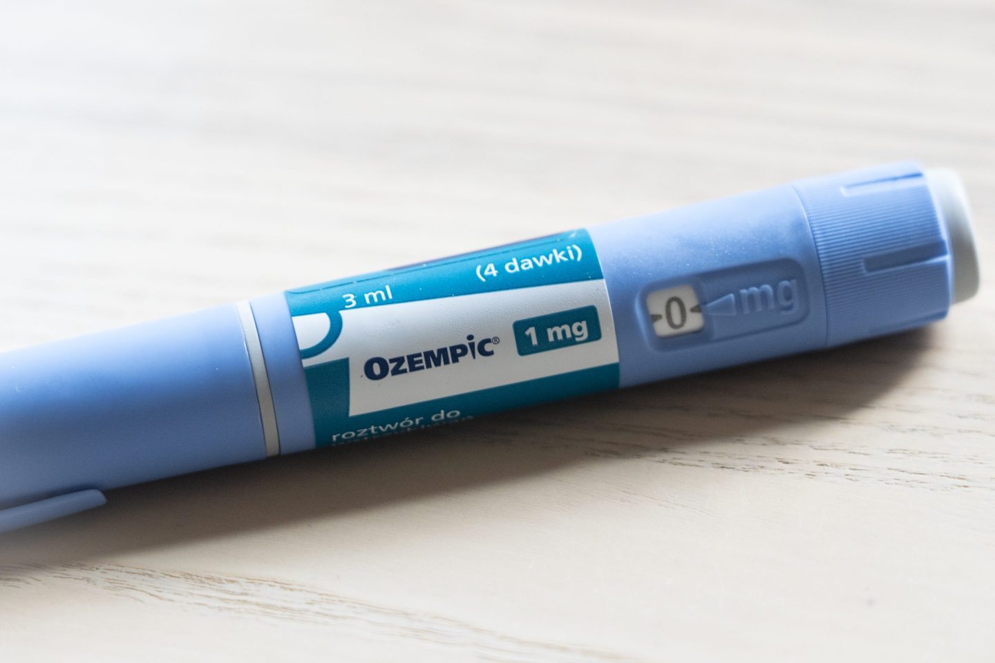 An Ozempic (semaglutide) injection pen is seen on a kitchen table.