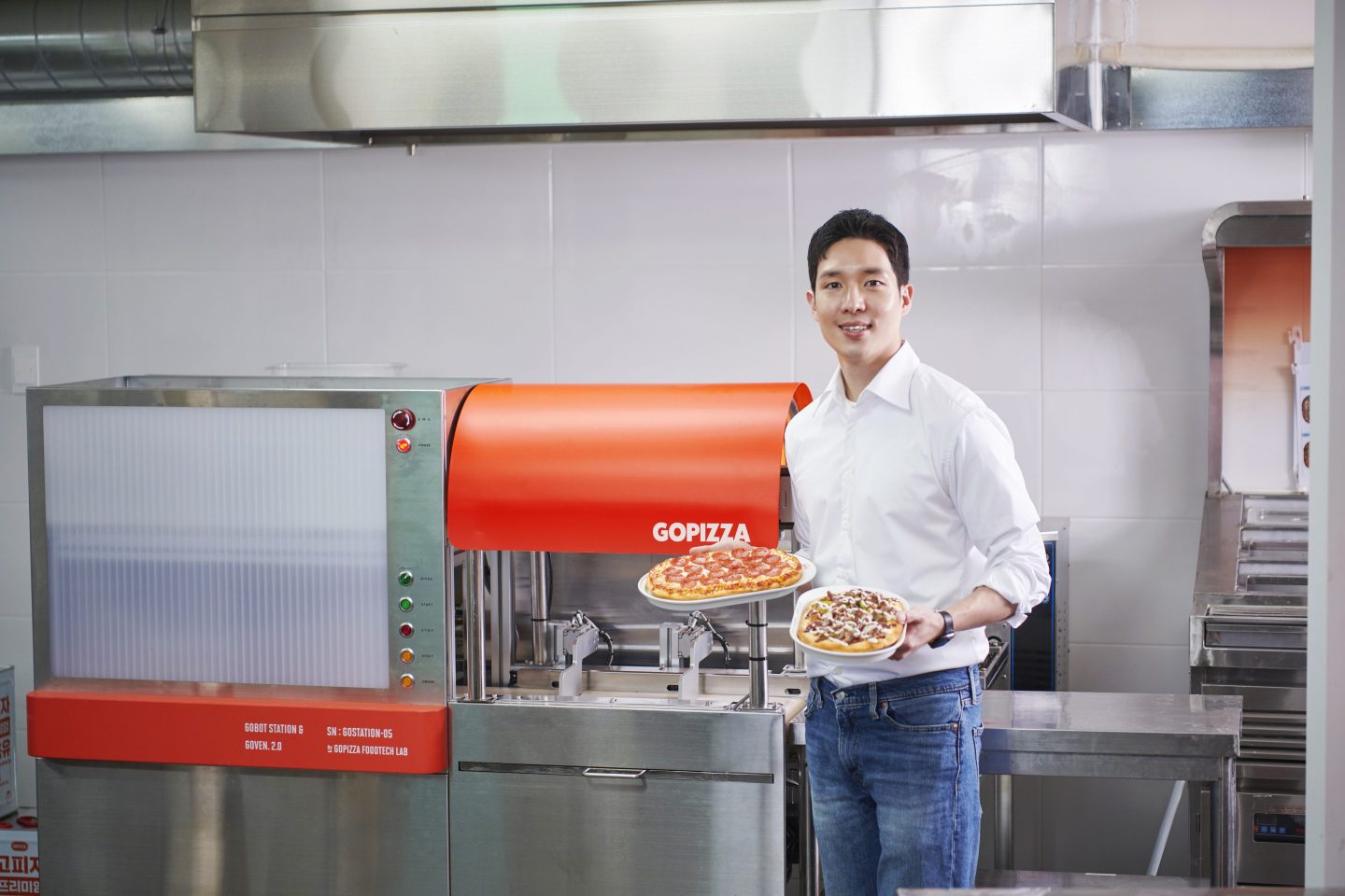 Jay Lim, the global CEO of Gopizza, with his pizza and Goven products.