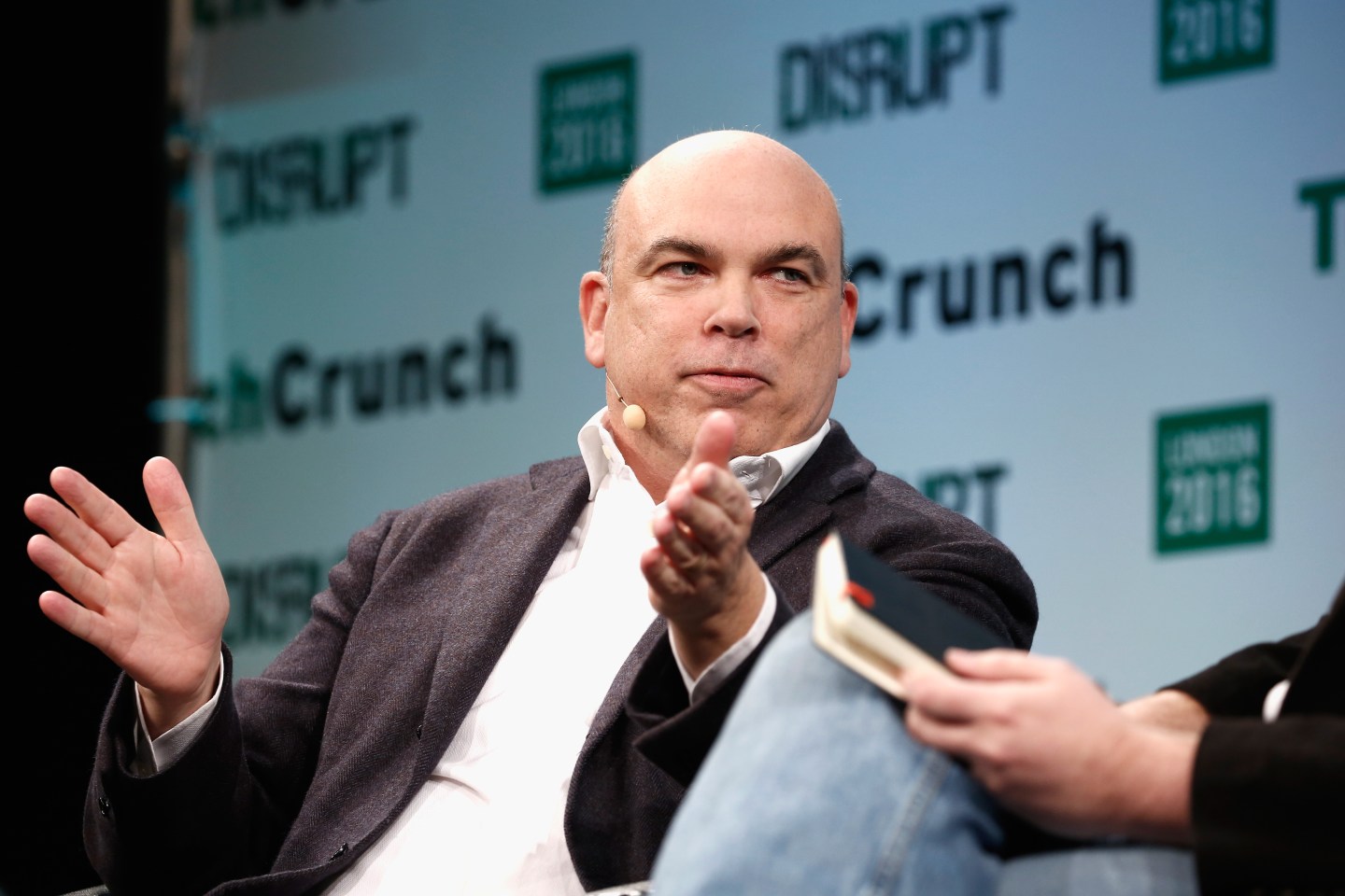Mike Lynch, on stage at TechCrunch in London