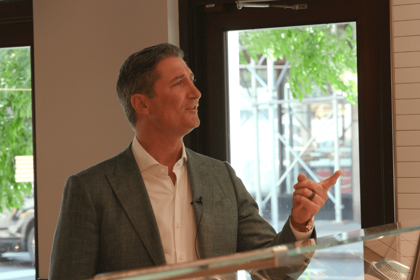 Brian Niccol at a Chipotle ordering food.