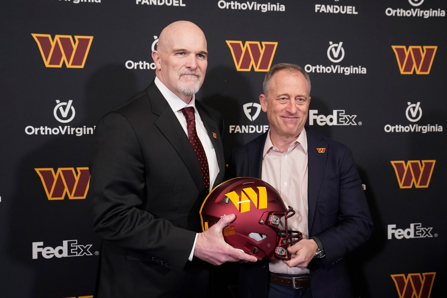 Head coach Dan Quinn of the Washington Command with managing partner Josh Harris, a cofounder of Apollo Global Management.
