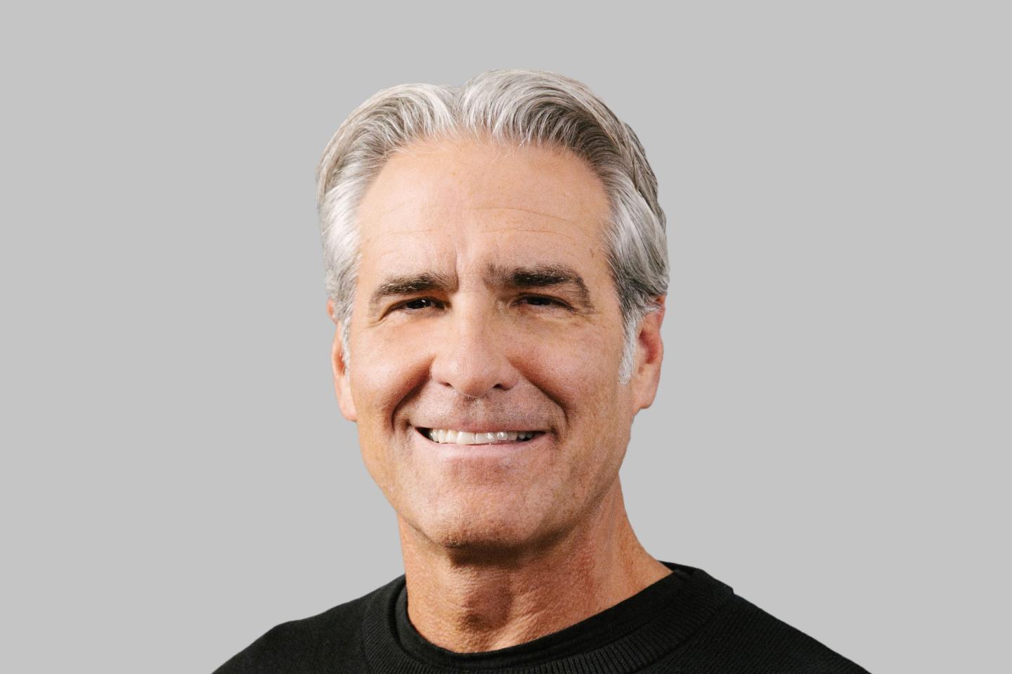 A headshot for incoming Nike CEO Elliott Hill, a company boomerang