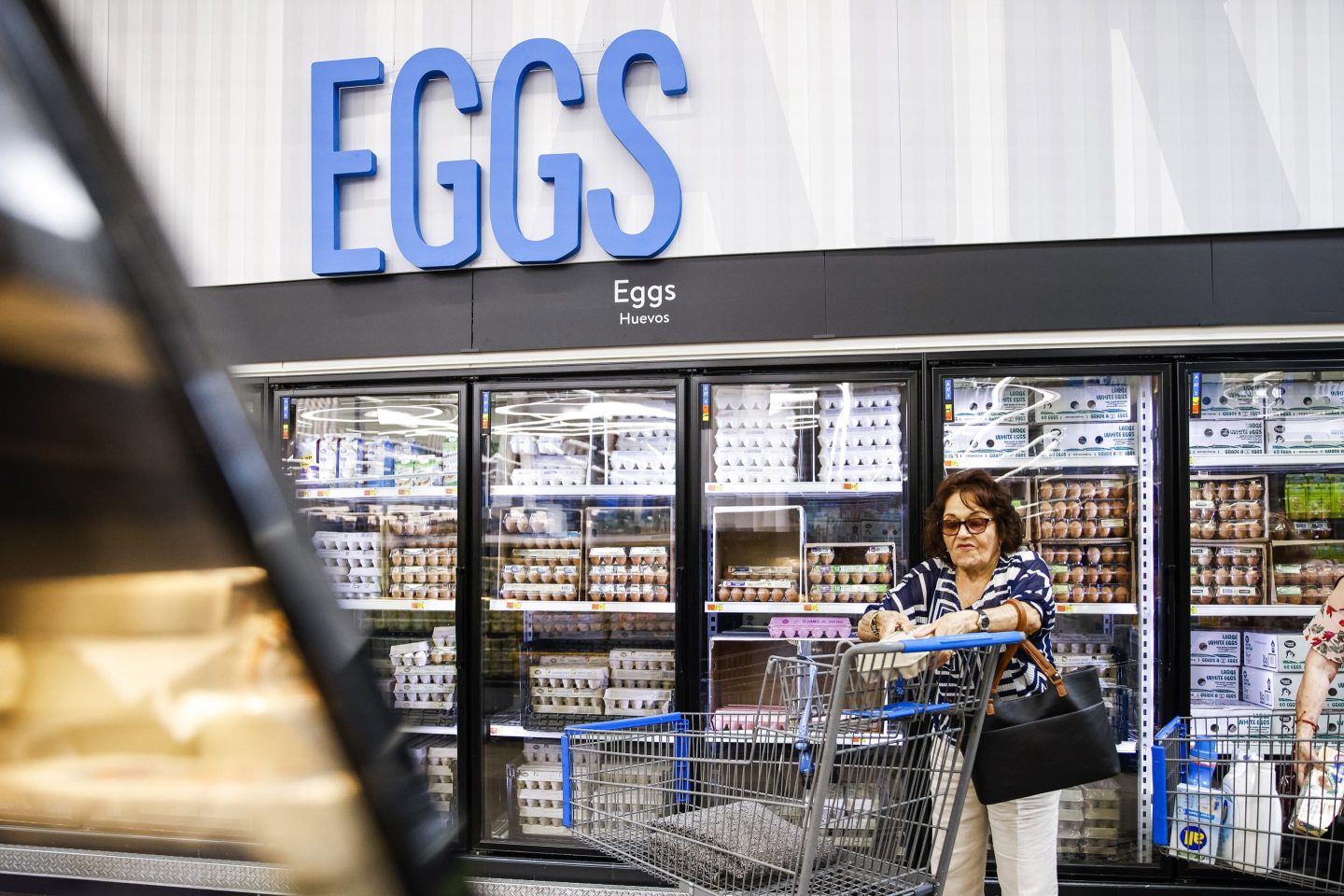 A woman buys eggs at a Walmart Superstore in Secaucus, N.J., on July 11, 2024. (