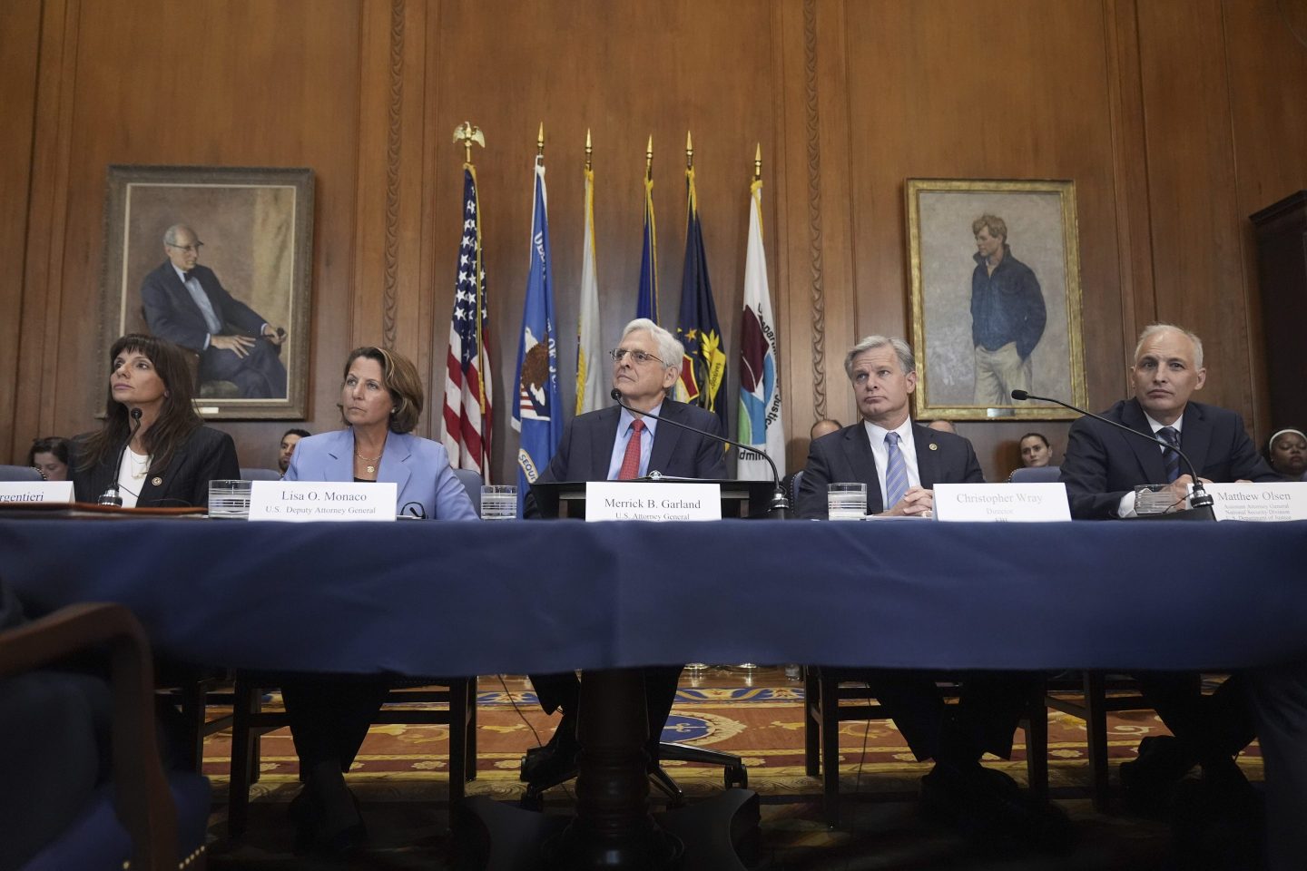 Attorney General Merrick Garland, center, speaks before a meeting of the Justice Department's Election Threats Task Force, at the Department of Justice, on Sept. 4, 2024, in Washington.