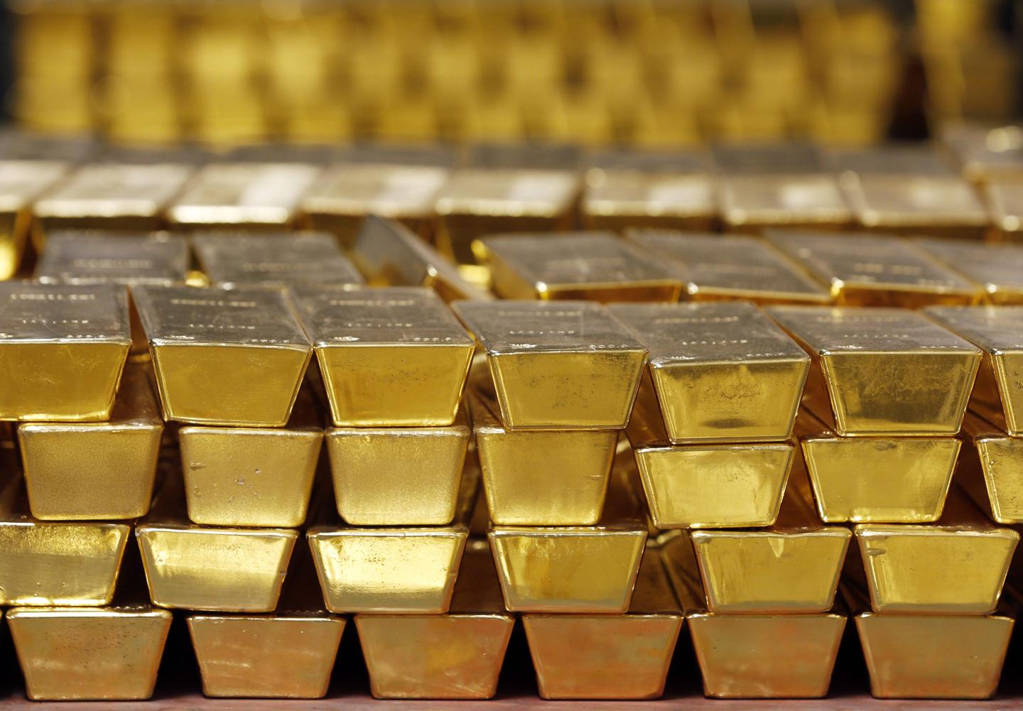 Gold bars are shown stacked in a vault at the United States Mint.