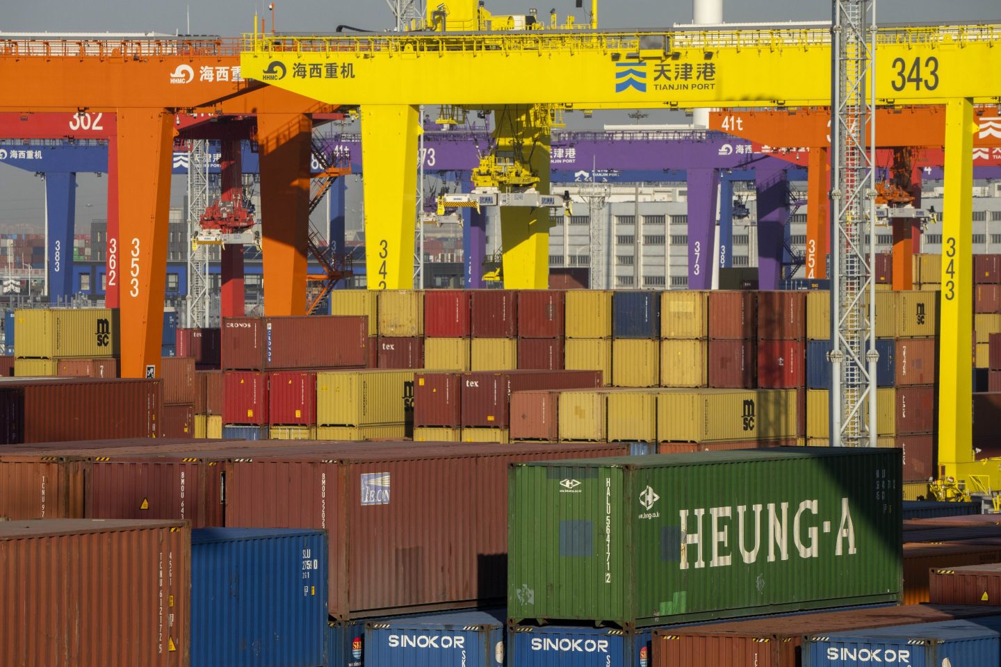Shipping containers are stacked at a port in Tianjin, China, on Jan. 16, 2023.