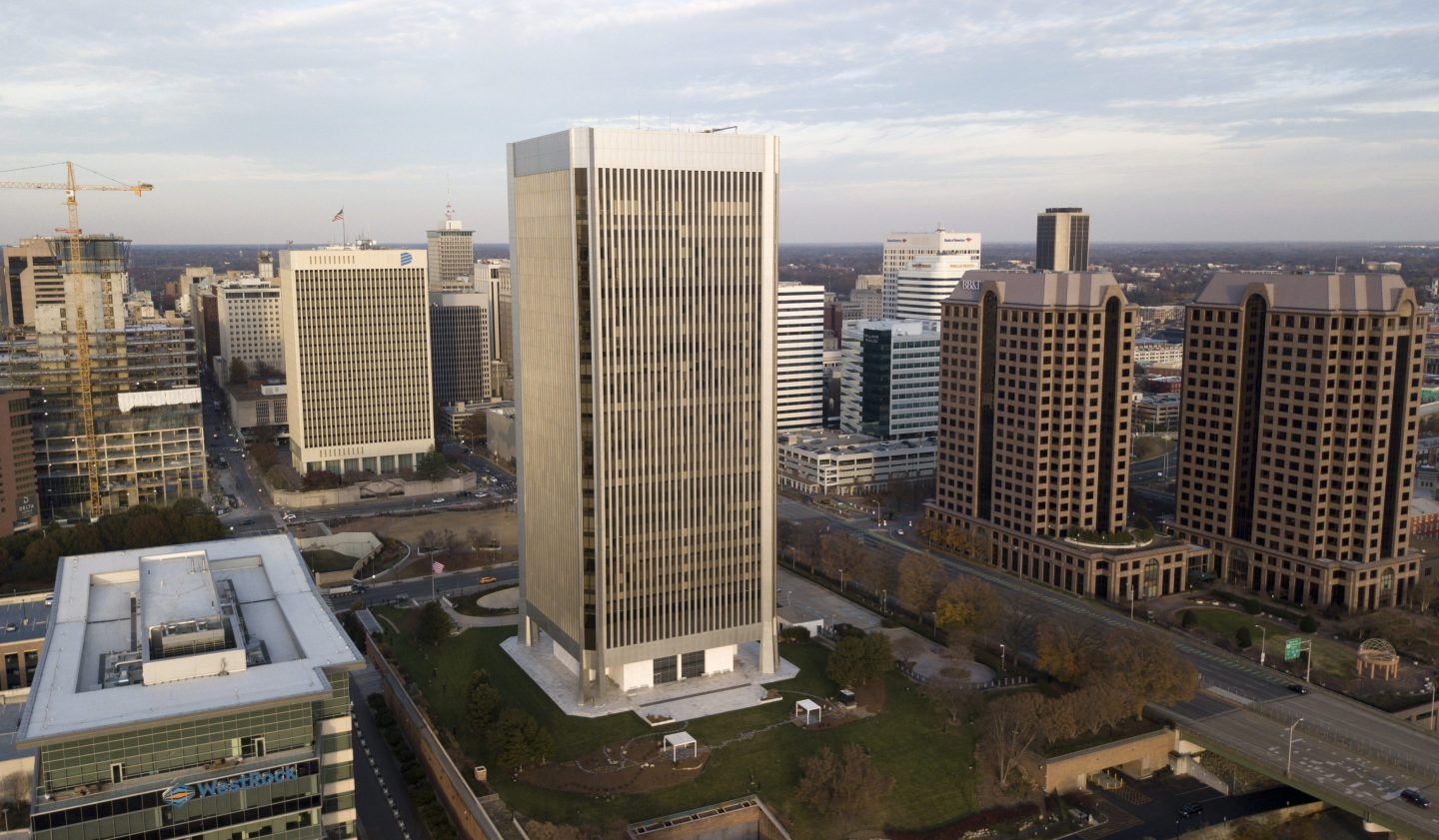 The Federal Reserve building, center, rises high over the skyline of Richmond, Va., on Dec. 4, 2017.