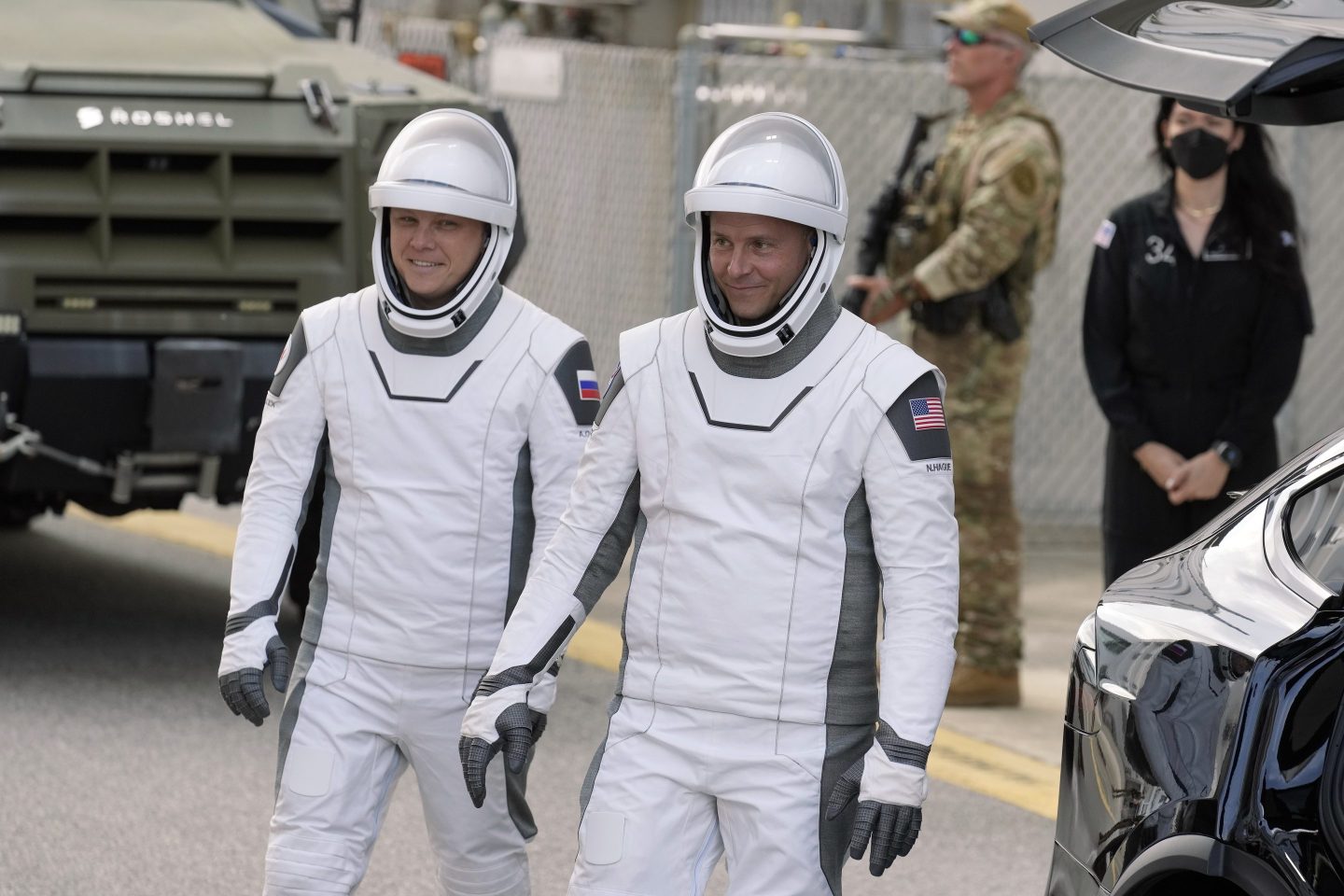 two astronauts in spacesuits