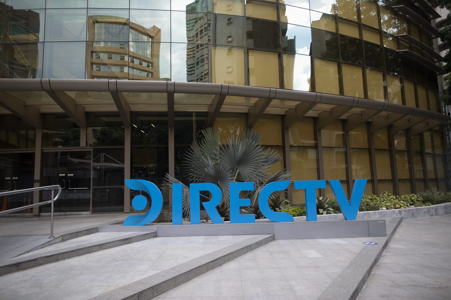 DirecTV said Monday that it will acquire Dish TV and Sling TV from its owner EchoStar in a debt exchange transaction that includes a payment of $1, plus an assumption of debt.
