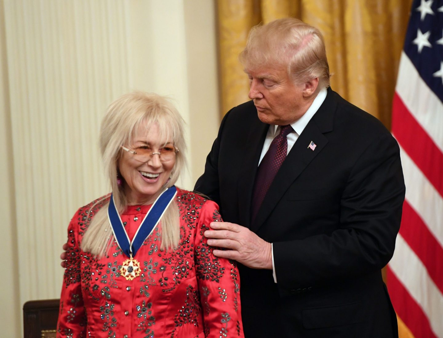 US President Donald Trump awards the Presidential Medal of Freedom to Doctor Miriam Adelson at the White House in Washington, DC, on November 16, 2018.