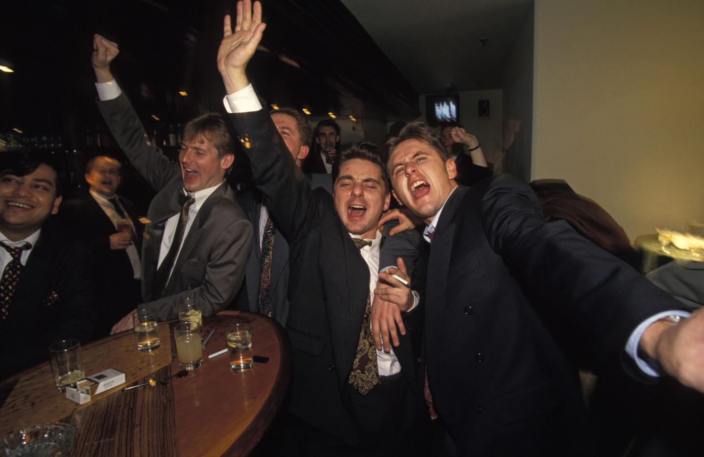 A group of young men sing karaoke at Coates Wine Bar in London