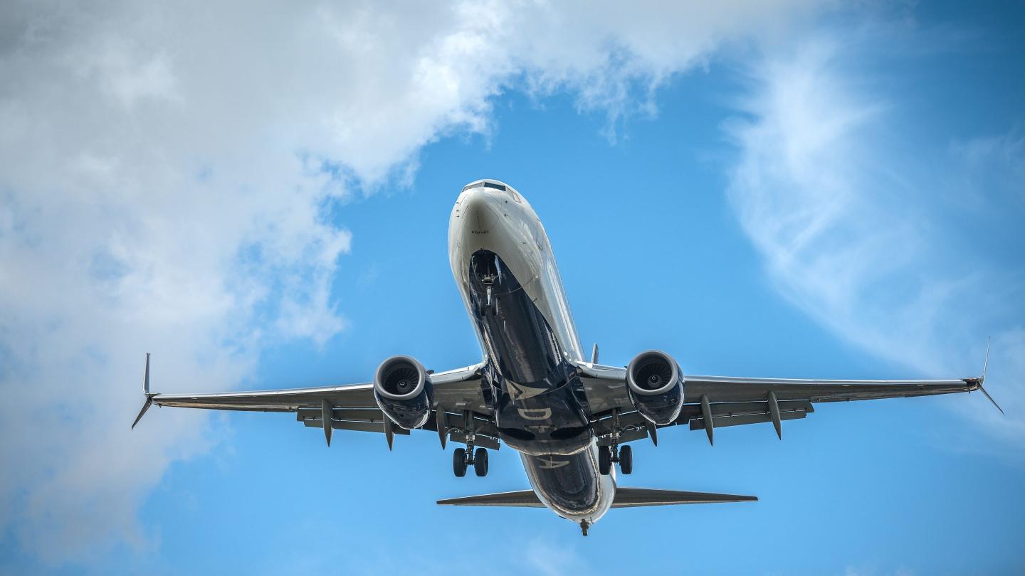 Miami, USA - February 11, 2022: Delta Airlines airplane (Boeing 737-900) taking off by Miami International airport. Founded in 1925, Delta is one of the major airlines of the United States and a legacy carrier.