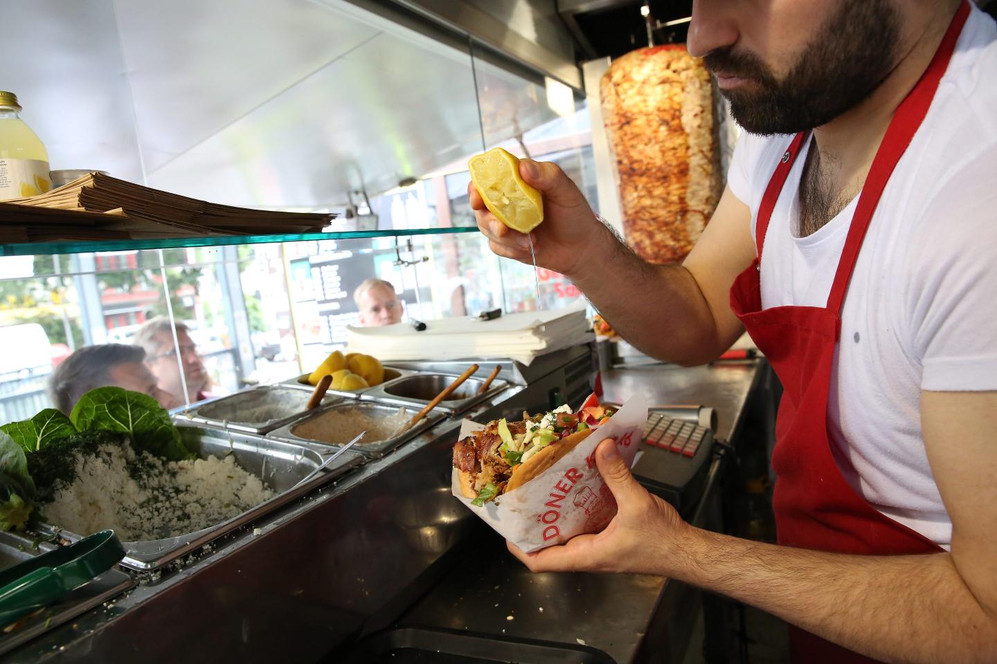 Person making the kebab