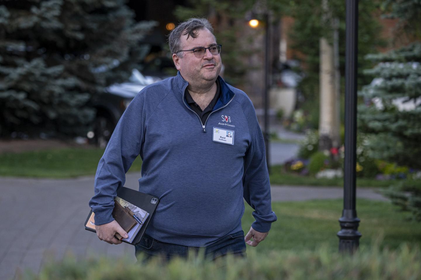 Reid Hoffman, co-founder of LinkedIn Corp., walks to the morning session during the Allen & Co. Media and Technology Conference.